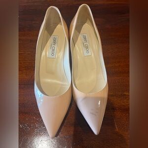 Jimmy Choo Cream Heels with Pointed Toe and Sleek Design